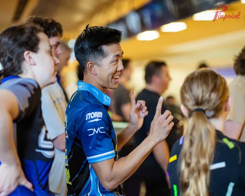 Darren Tang talks with young bowlers at our first clinic, 2024