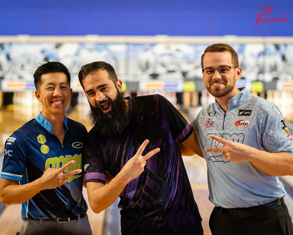 Darren Tang and Chris Via throw peace signs with a bowler at our first clinic, 2024