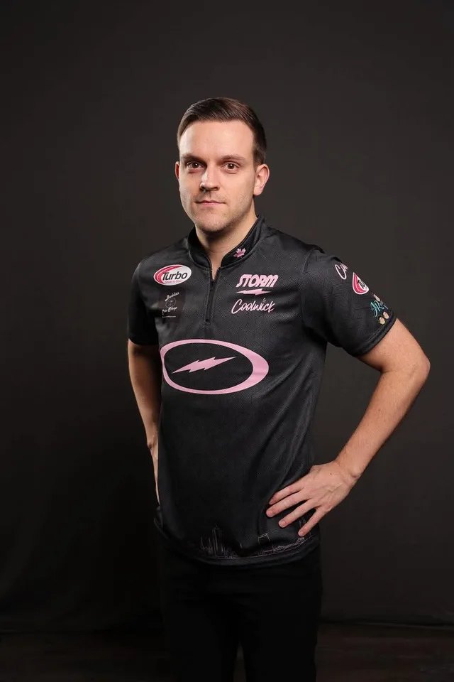 François Lavoie in his black and pink Storm jersey, hand on his hip